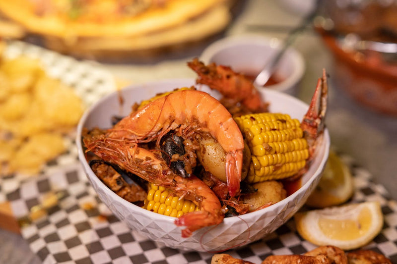 A bowl from a seafood boil that can be reheated